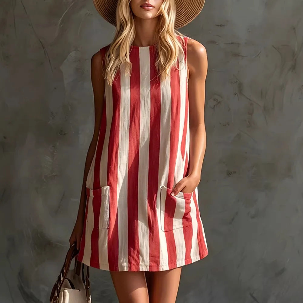 A stylish sleeveless mini dress featuring retro striped prints, a comfy loose fit, and a practical side pocket. Perfect for summer outings, holidays, and casual everyday wear with a relaxed, effortless vibe