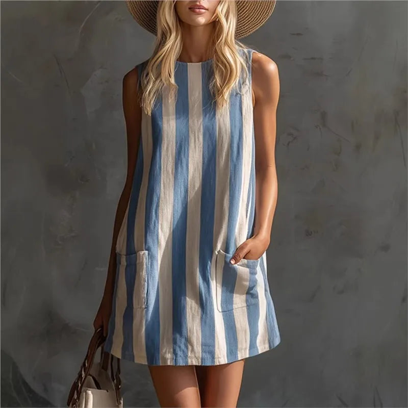 A stylish sleeveless mini dress featuring retro striped prints, a comfy loose fit, and a practical side pocket. Perfect for summer outings, holidays, and casual everyday wear with a relaxed, effortless vibe