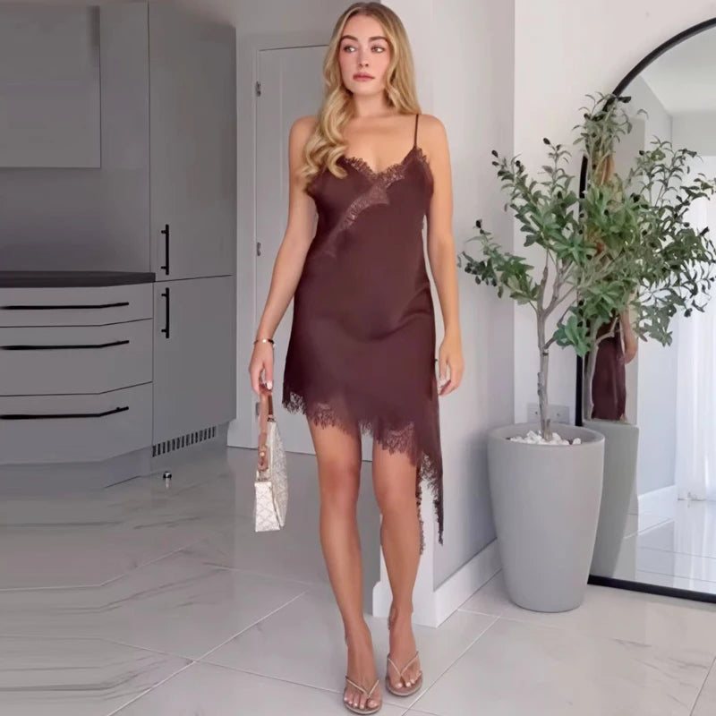 A sexy asymmetric lace slip dress featuring a mini length, open back, and elegant halter design. Made with soft, lightweight fabric that highlights your curves—perfect for summer nights, parties, and evening occasions