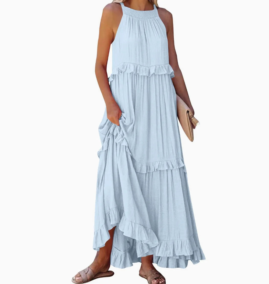A stylish sleeveless mini dress featuring a soft lotus‑leaf hem and a relaxed, feminine fit. Perfect for summer outings, holidays, and casual everyday wear with an effortless chic look