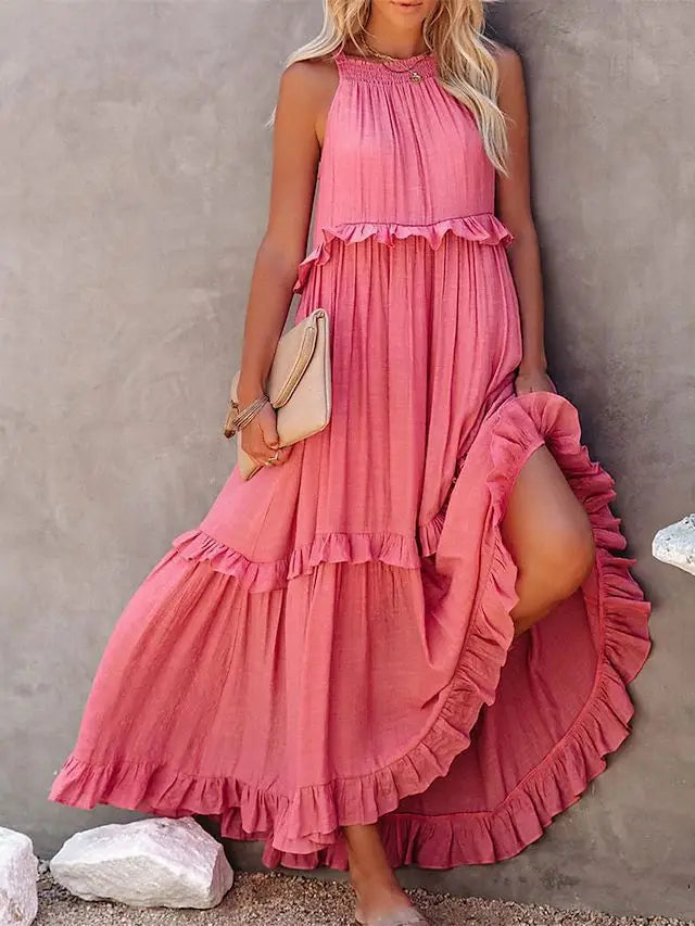 A stylish sleeveless mini dress featuring a soft lotus‑leaf hem and a relaxed, feminine fit. Perfect for summer outings, holidays, and casual everyday wear with an effortless chic look