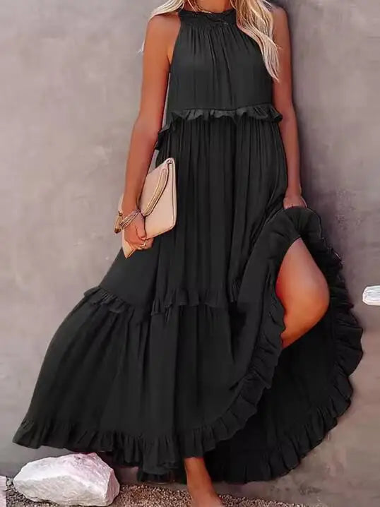 A stylish sleeveless mini dress featuring a soft lotus‑leaf hem and a relaxed, feminine fit. Perfect for summer outings, holidays, and casual everyday wear with an effortless chic look