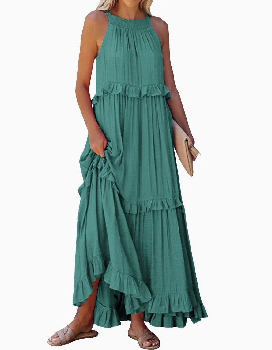 A stylish sleeveless mini dress featuring a soft lotus‑leaf hem and a relaxed, feminine fit. Perfect for summer outings, holidays, and casual everyday wear with an effortless chic look