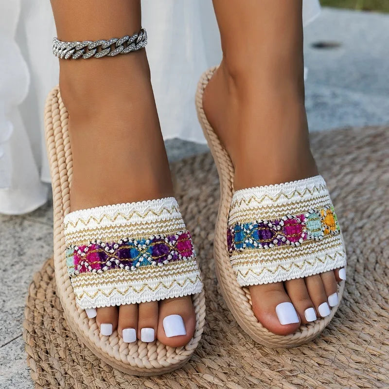 Stylish bohemian flat sandals designed with soft comfort, tassel details, and a chic ethnic look. Perfect for outdoor wear, beach days, and everyday summer outfits—lightweight, fashionable, and ideal for women who love effo