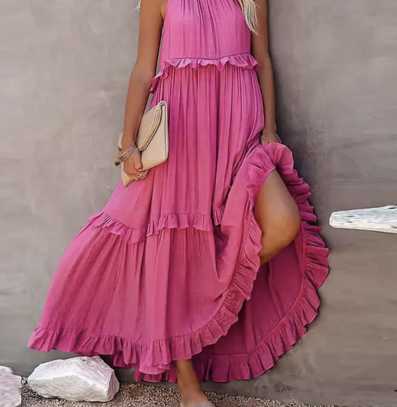 A stylish sleeveless mini dress featuring a soft lotus‑leaf hem and a relaxed, feminine fit. Perfect for summer outings, holidays, and casual everyday wear with an effortless chic look