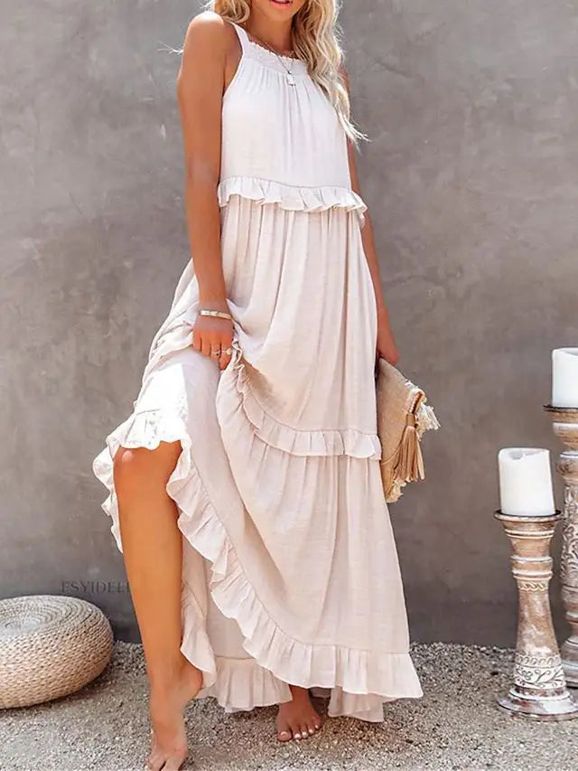 A stylish sleeveless mini dress featuring a soft lotus‑leaf hem and a relaxed, feminine fit. Perfect for summer outings, holidays, and casual everyday wear with an effortless chic look