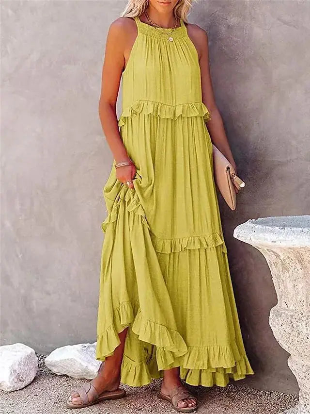 A stylish sleeveless mini dress featuring a soft lotus‑leaf hem and a relaxed, feminine fit. Perfect for summer outings, holidays, and casual everyday wear with an effortless chic look