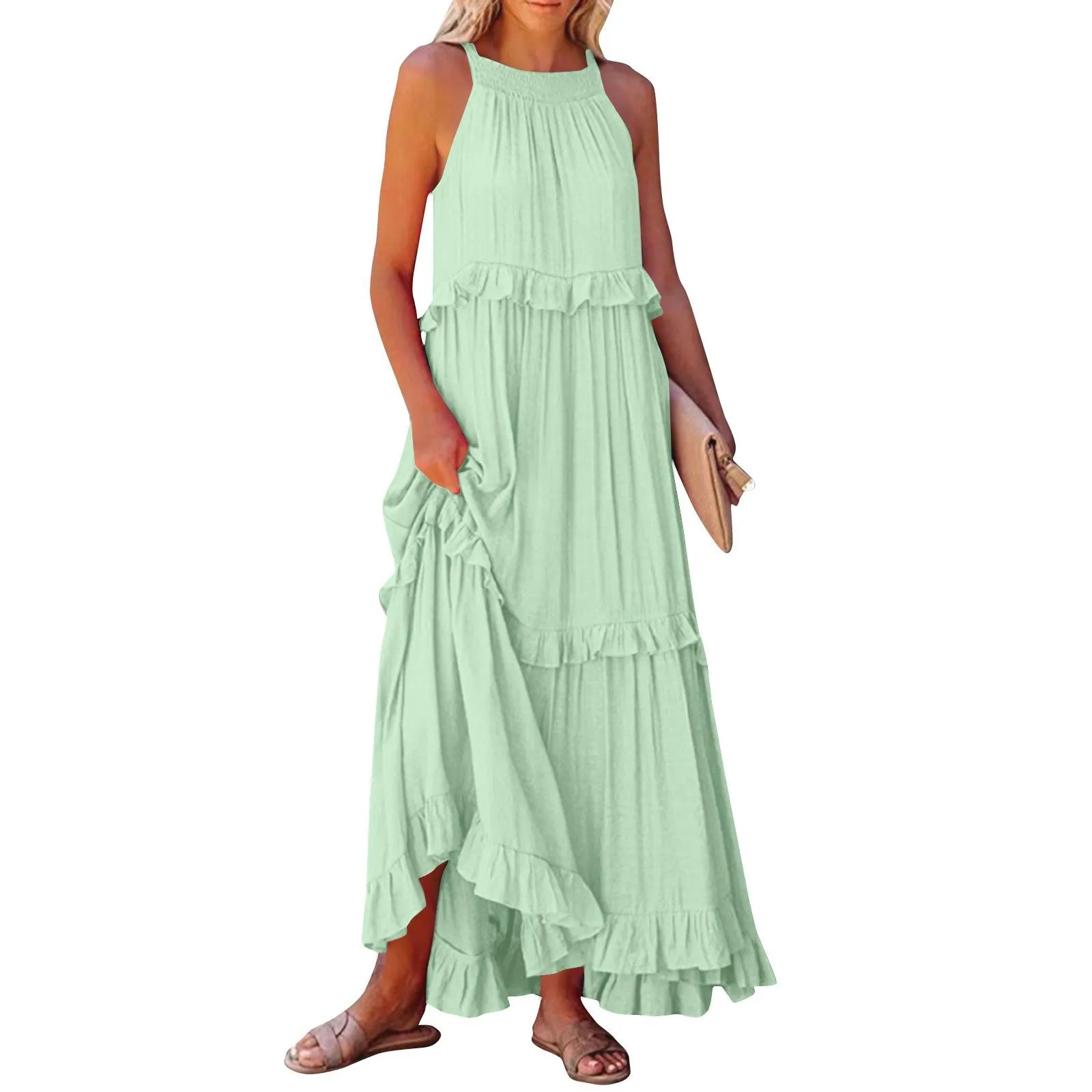 A stylish sleeveless mini dress featuring a soft lotus‑leaf hem and a relaxed, feminine fit. Perfect for summer outings, holidays, and casual everyday wear with an effortless chic look