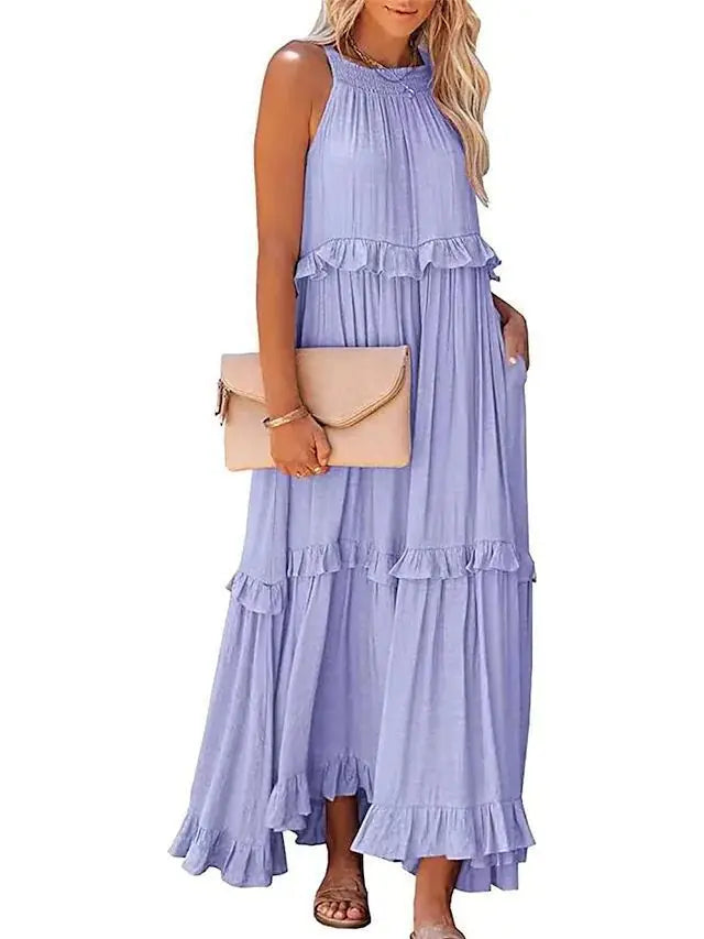 A stylish sleeveless mini dress featuring a soft lotus‑leaf hem and a relaxed, feminine fit. Perfect for summer outings, holidays, and casual everyday wear with an effortless chic look